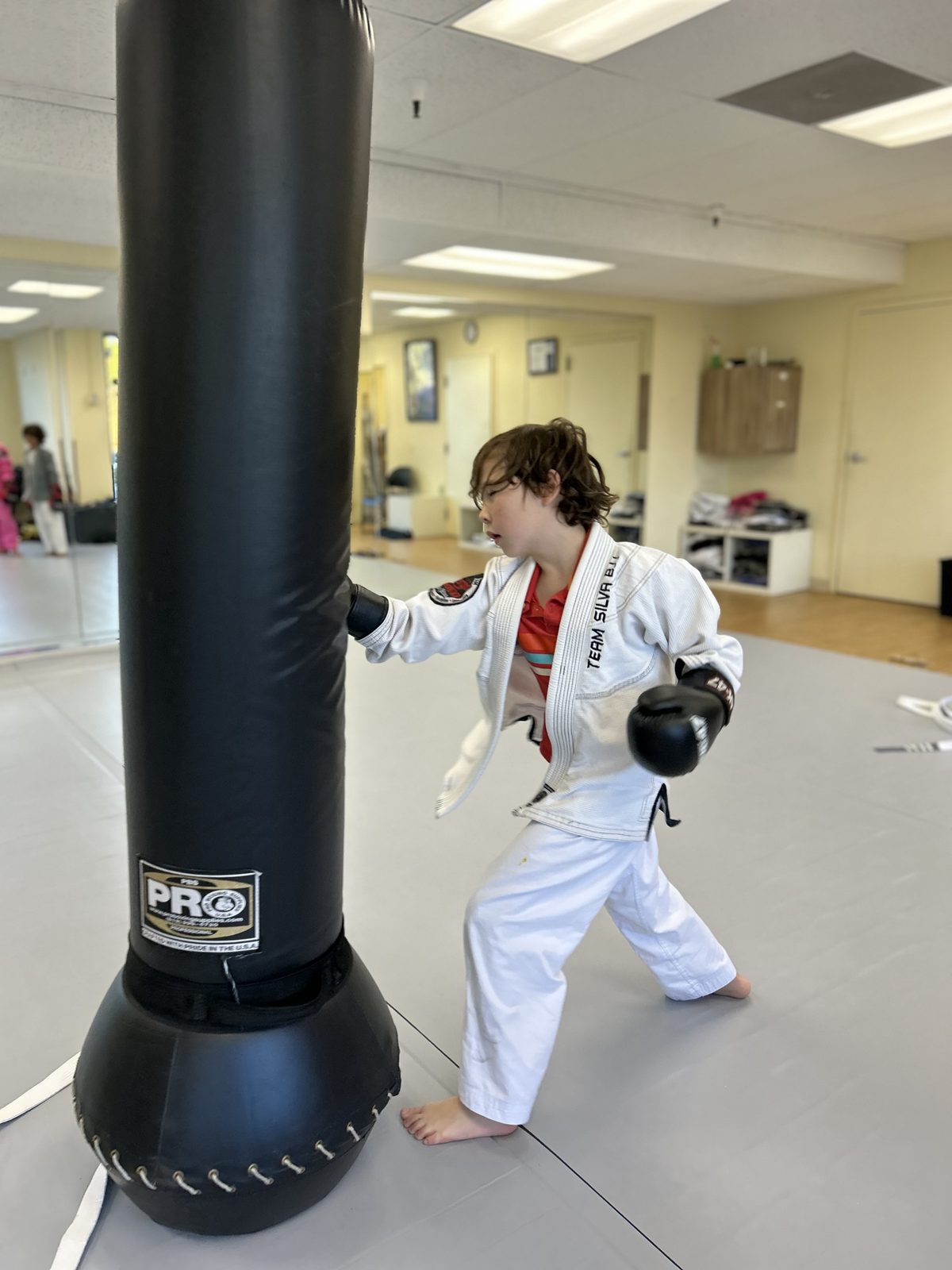 Kids practicing Brazilian Jiu-Jitsu and Self-Defense in Alameda